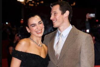 Dua Lipa, Callum Turner red carpet