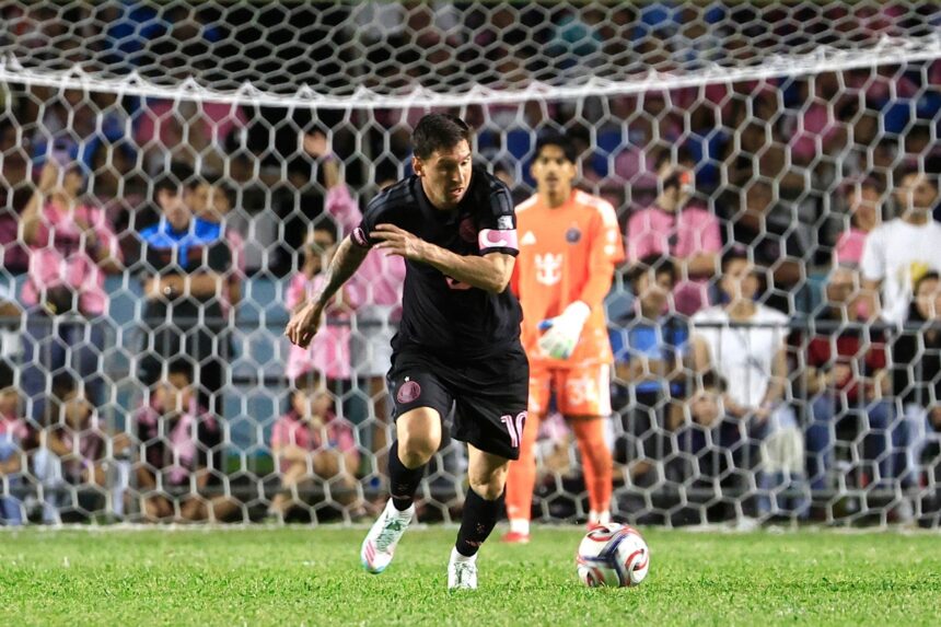 Lionel Messi knocked down